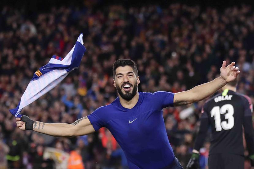 Luis Súarez celebra su gol en el partido. (AP)