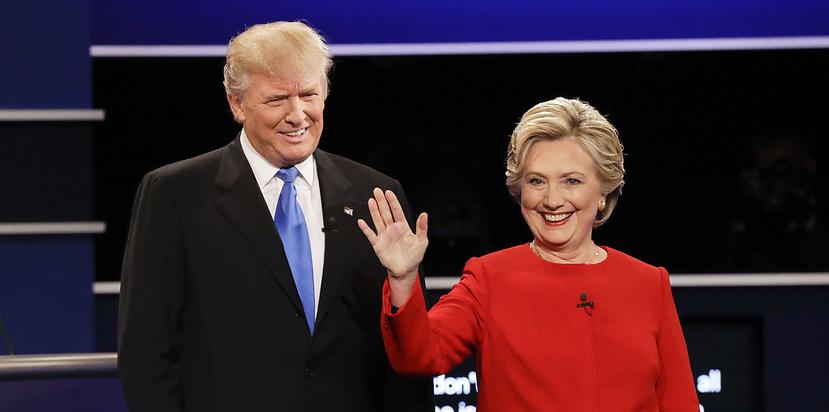 Trump invita a los votantes a ver vídeo sexual, mientras Clinton sugiere que miren película porno en la que aparece brevemente el candidato republicano. (AP)