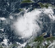 Esta foto de satélite suministrada por la NOAA muestra la tormenta tropical Ian sobre el Caribe el 24 de septiembre del 2022.