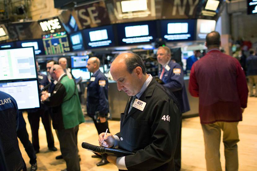 El incremento  de hoy, viernes, fue suficiente para empujar dos de los tres principales índices en Wall Street a obtener ganancias para la semana. (AP)