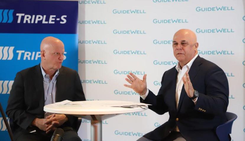 Los principales ejecutivos de Triple-S Management y GuideWell Mutual Holding, Roberto "Bobby" García y Pat Geraghty, respectivamente, durante la presentación en la que ofrecieron detalles acerca de la fusión de ambas aseguradoras.