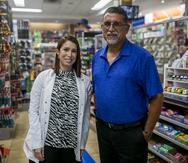 Jannette Sotos Mejias y su padre Steve Raymond Soto Villalobos, propietarios de la Farmacia del Pozo, en la Carre. #149 en Manatí.
