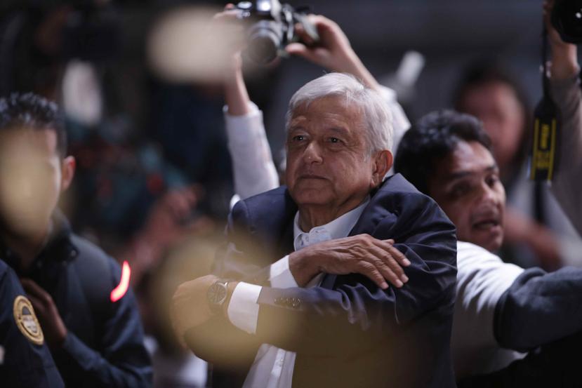 El INE dijo en su página de internet que Andrés López Obrador obtuvo 53,2% de los votos. (AP / Moisés Castillo)