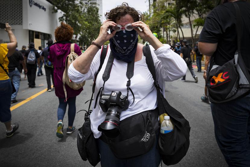 La fotoperiodista puertorriqueña Ana Martínez también cubrió eventos como manifestaciones en contra del Gobierno.