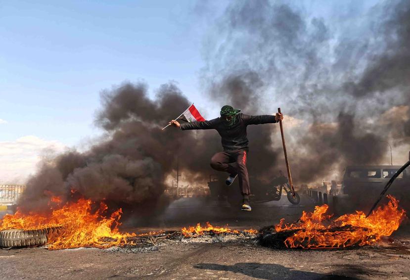 Una protesta en Nayaf, Irak. (AP/Hadi Mizban)