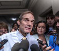 Rep. Jim Jordan, R-Ohio, chairman of the House Judiciary Committee and a staunch ally of former President Donald Trump, talks with reporters as House Republicans meet again behind closed doors to find a path to elect a new speaker after House Majority Leader Steve Scalise, R-La., dropped out of the race Thursday night, at the Capitol in Washington, Friday, Oct. 13, 2023. (AP Photo/J. Scott Applewhite)