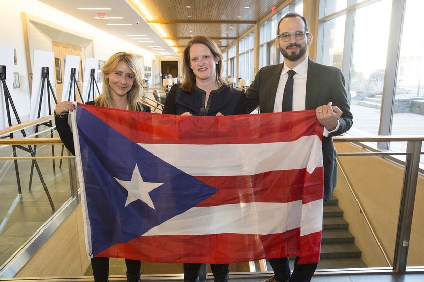 Natalie Trigo Reyes, J.D. '19 (from left), Lee Mestre, and Andrew Crespo '08, assistant professor of law, led a group of Law School students. (Jon Chase/Harvard)