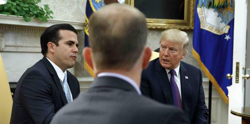 The governor Ricardo Rosselló (left) made the declarations after yesterday meeting with president Donald Trump (right). (AP)
