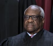 FILE - Associate Justice Clarence Thomas joins other members of the Supreme Court as they pose for a new group portrait, at the Supreme Court building in Washington, Oct. 7, 2022. Supreme Court Justice Clarence Thomas on Monday, Oct. 24, temporarily blocked Sen. Lindsey Graham's testimony to a special grand jury investigating whether then-President Donald Trump and others illegally tried to influence the 2020 election in the state. (AP Photo/J. Scott Applewhite, File)
