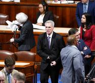 Rep. Kevin McCarthy, R-Calif., walks on the floor after the House voted to adjourn for the evening in the House chamber as the House meets for a second day to elect a speaker and convene the 118th Congress in Washington, Wednesday, Jan. 4, 2023. (AP Photo/Andrew Harnik)