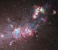 This NASA image released on May 13, 2011 shows the dwarf galaxy NGC 4214  ablaze with young stars and gas clouds. Located around 10 million light-years away in the constellation of Canes Venatici (The Hunting Dogs), the galaxy's close proximity, combined with the wide variety of evolutionary stages among the stars, make it an ideal laboratory to research the triggers of star formation and evolution. This color image was taken using the Hubble Space Telescope's Wide Field Camera 3 in December 2009. AFP PHOTO/NASA/HANDOUT/RESTRICTED TO EDITORIAL USE - MANDATORY CREDIT " AFP PHOTO / - NO MARKETING NO ADVERTISING CAMPAIGNS - DISTRIBUTED AS A SERVICE TO CLIENTS