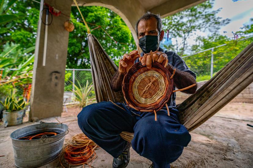 Aladino Muñiz has been weaving baskets for more than 40 years, a craft he learned from his father. 