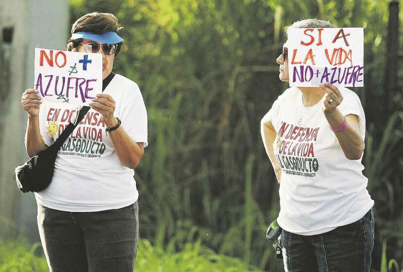 En 2011, vecinos de comunidades aledañas a la central Palo Seco, en Toa Baja y Cataño, protestaron contra la intención del gobierno de flexibilizar el contenido de azufre en el combustible que la AEE quema en sus plantas. (Archivo / GFR Media)