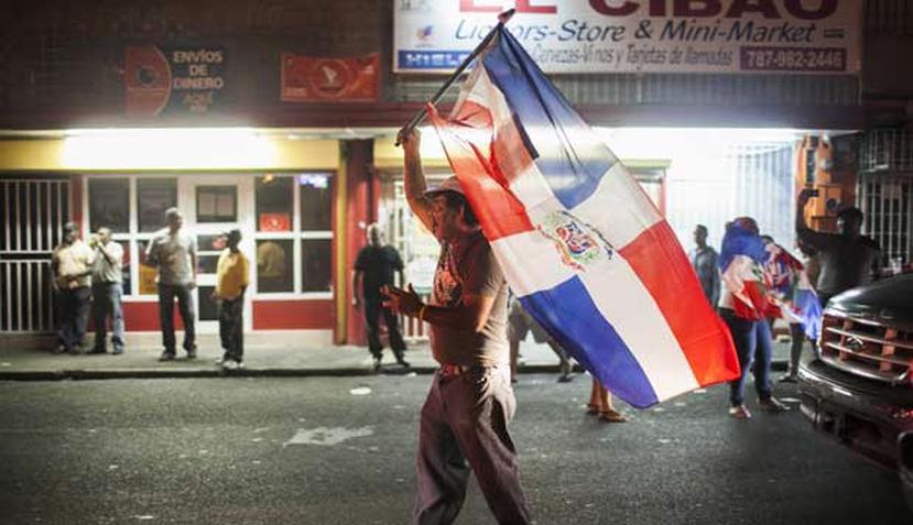 La comunidad dominicana celebró en las calles la victoria de su equipo. (GFR/ DENNIS M. RIVERA PICHARDO)