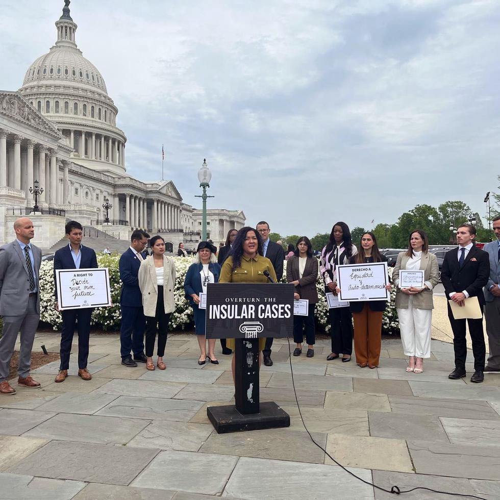 The delegate from the Virgin Islands, Stacey Plaskett, speaks at the press conference where the US Department of Justice was urged to reject the Insular Cases doctrine.