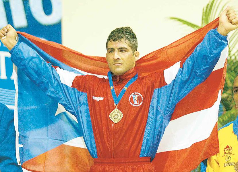 Manuel García, actual presidente de la Federación de Luchas de Puerto Rico, hizo historia al ganar el oro en El Salvador 2002. (Archivo / GFR Media)