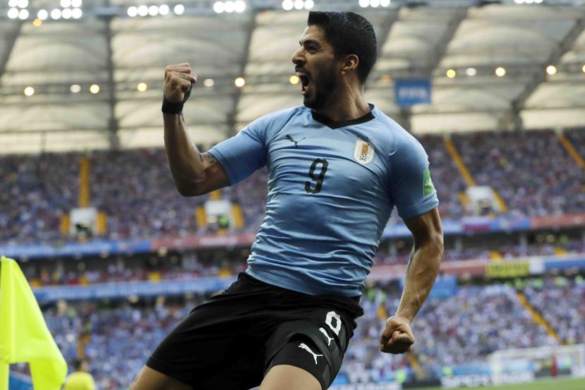 Luis Suárez celebra su gol en el partido. (AP)