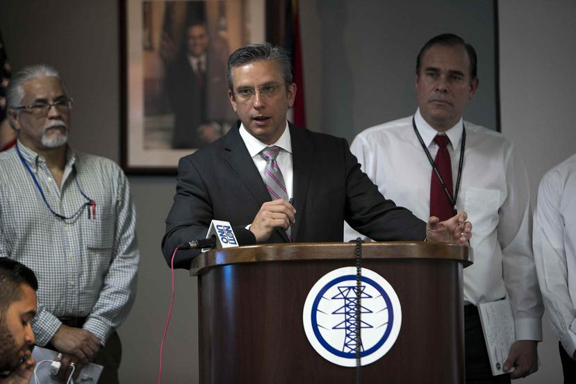 García Padilla during a press conference held at the Puerto Rico Electric Power Authority.
