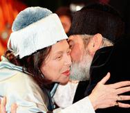 Brazilian writer Nelida Pinon, left, is embraced by university rector Dario Villanueva after she was awarded an honorary degree at Santiago de Compostela's university Wednesday, April 1, 1998. (AP Photo/Lavandeira/EFE) SPAIN OUT