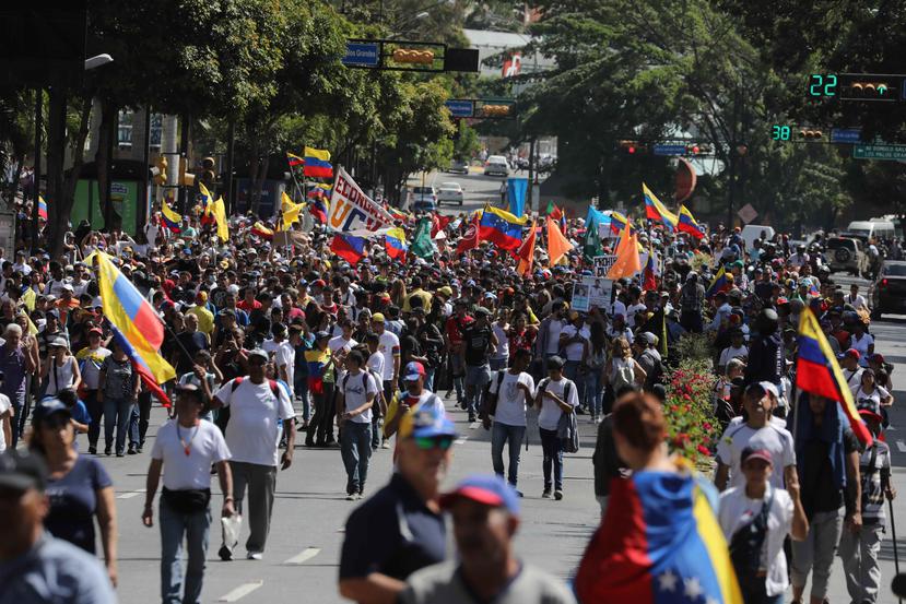 En esta foto de archivo, cientos de personas opositoras al gobierno del presidente de Venezuela, Nicolás Maduro, marchan  en Caracas (Venezuela). (EFE)
