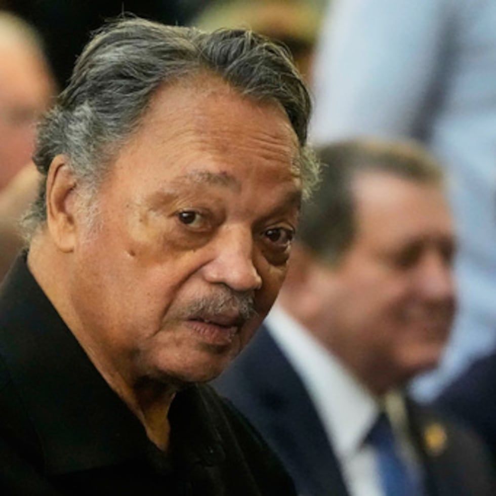 FILE - The Rev. Jesse Jackson listens to speakers at the Tabernacle Baptist Church during the 60th anniversary of the march to ensure that African Americans could exercise their constitutional right to vote, March 9, 2025, in Selma, Ala. (AP Photo/Mike Stewart, File)