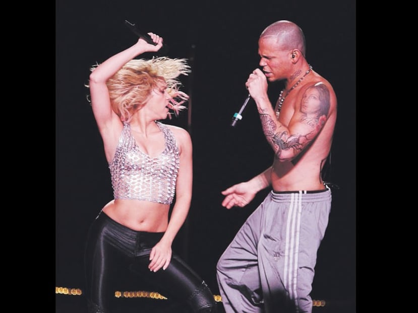 Shakira y René Pérez de Calle 13. (Archivo/ GFR Media)