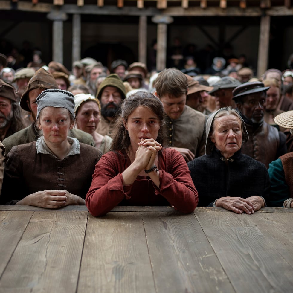 Jessie Buckley (center) in a scene from "Hamnet." Agata Grzybowska / Focus Features via AP