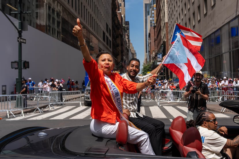 Congresswoman Nydia Velázquez and Brooklyn Borough President Antonio Reynoso take part in the National Puerto Rican Day Parade, Sunday, June 14, 2026 in New York. (AP Photo/Adam Gray)