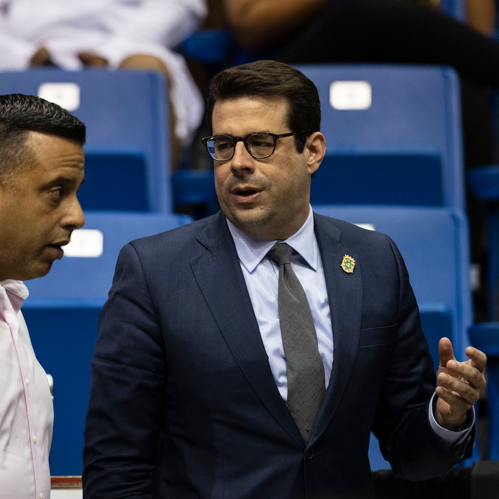 Francisco Domenech (center) has not stated if he will attend the proceeding.