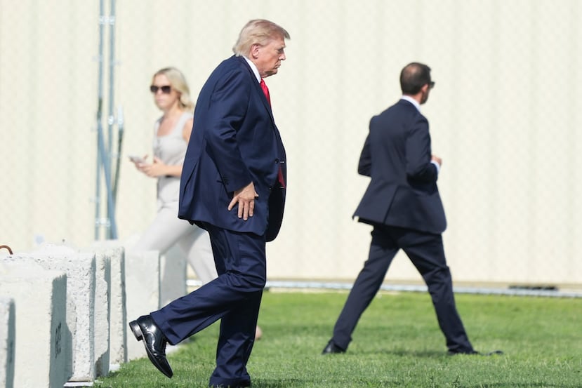 President Donald Trump walks to board Marine One on the Ellipse, Friday, Aug. 21, 2026, near the White House in Washington. (AP Photo/Allison Robbert)