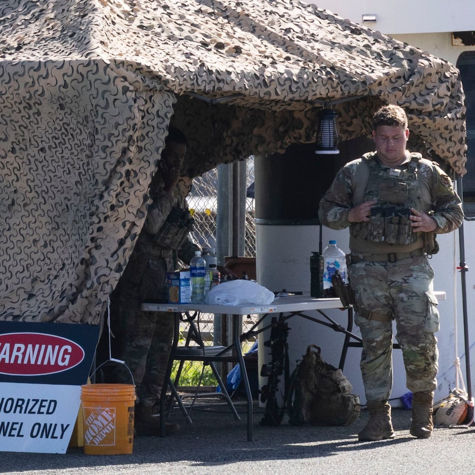 Armed soldiers guard the gate that gives access to the José Aponte de la Torre airport, at the former Roosevelt Roads naval base, in Ceiba.