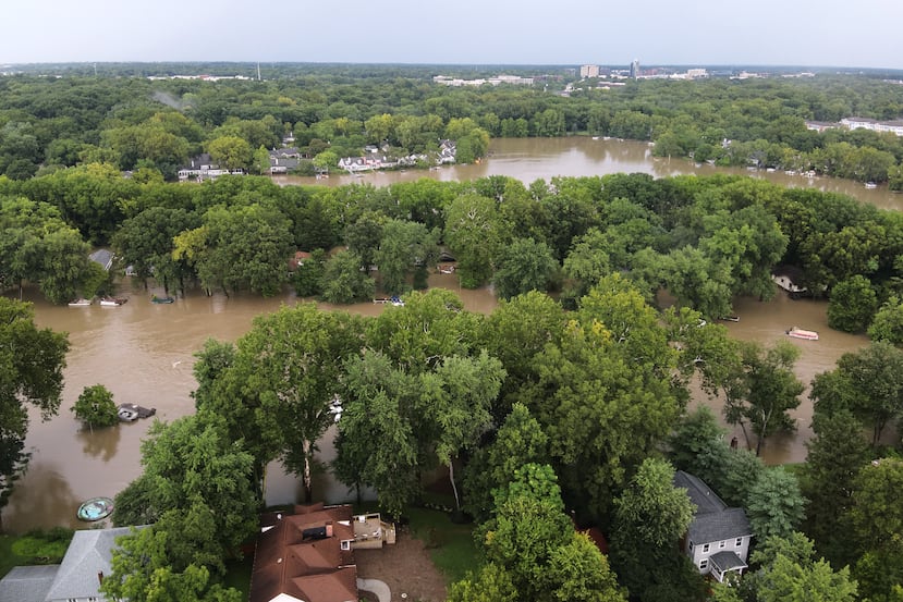 This aerial photo provided by the Indianapolis Fire Department shows flooding in northern Indianapolis, Ind., Saturday, Aug. 15, 2026. (Indianapolis Fire Department via AP)