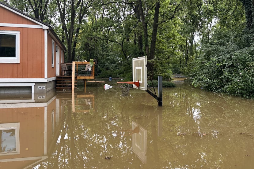 This photo provided by the Indianapolis Fire Department shows flooding in northern Indianapolis, Ind., Saturday, Aug. 15, 2026. (Indianapolis Fire Department via AP)