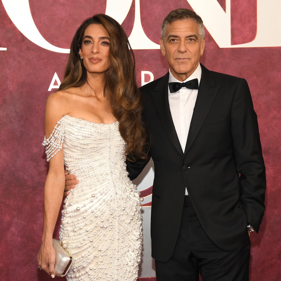 Amal Clooney, left, and George Clooney arrive at the 78th Tony Awards on Sunday, June 8, 2025, at Radio City Music Hall in New York. (Photo by Evan Agostini/Invision/AP)