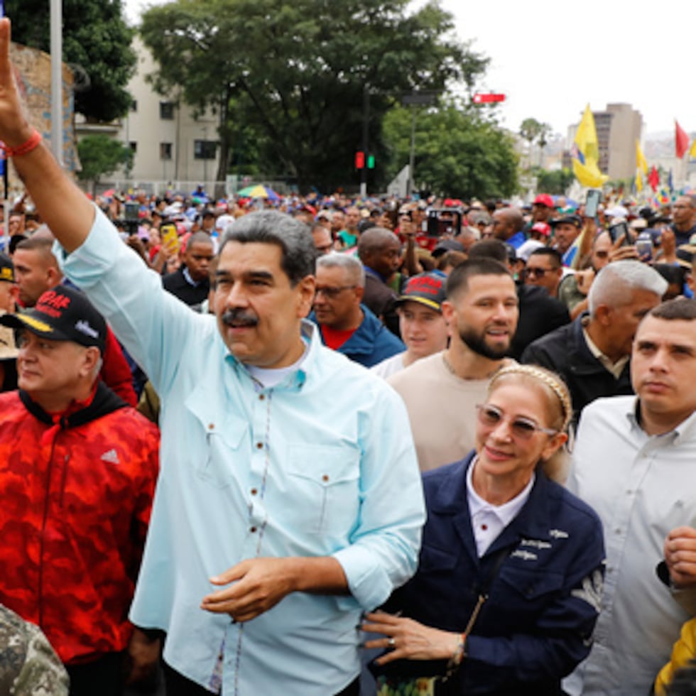 El presidente Nicolás Maduro participa en una manifestación para conmemorar el aniversario de la Batalla de Santa Inés, que tuvo lugar durante la Guerra Federal del siglo XIX en Venezuela, en Caracas, Venezuela, miércoles 10 de diciembre de 2025. (AP Photo/Cristian Hernandez)