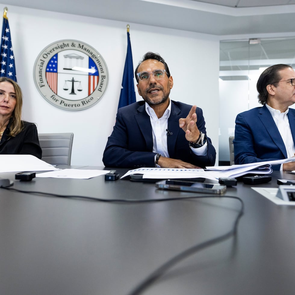 Robert Mujica (center) is the director of the Fiscal Oversight Board as of January 2023.