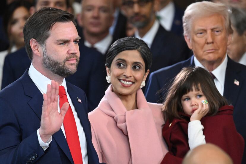 J.D. Vance takes the oath of office as Vice President during the 60th Presidential Inauguration in the Rotunda of the U.S. Capitol in Washington, Monday, Jan. 20, 2025, as his wife, Usha Vance, looks on. (Saul Loeb/Pool photo via AP)
