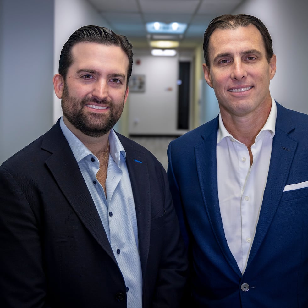 Juan Carlos Tassara (right) and Arturo Vidal, partners of North Development, presented in Puerto Rico the new Domus Brickell Center condo hotel that their firm is building in the popular Miami district.