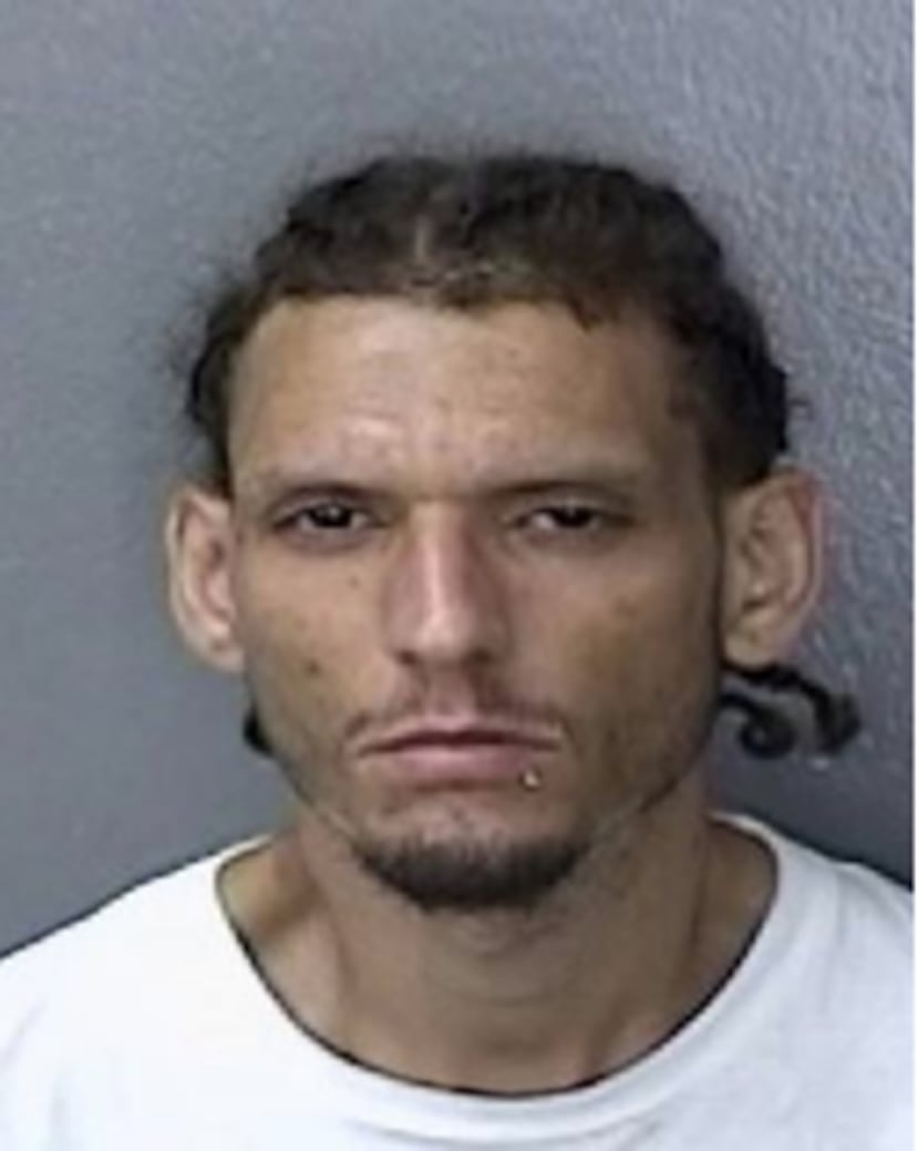 Ficha policial de Alex D. Rivera Ramos, de 30 años y residente en San Juan.