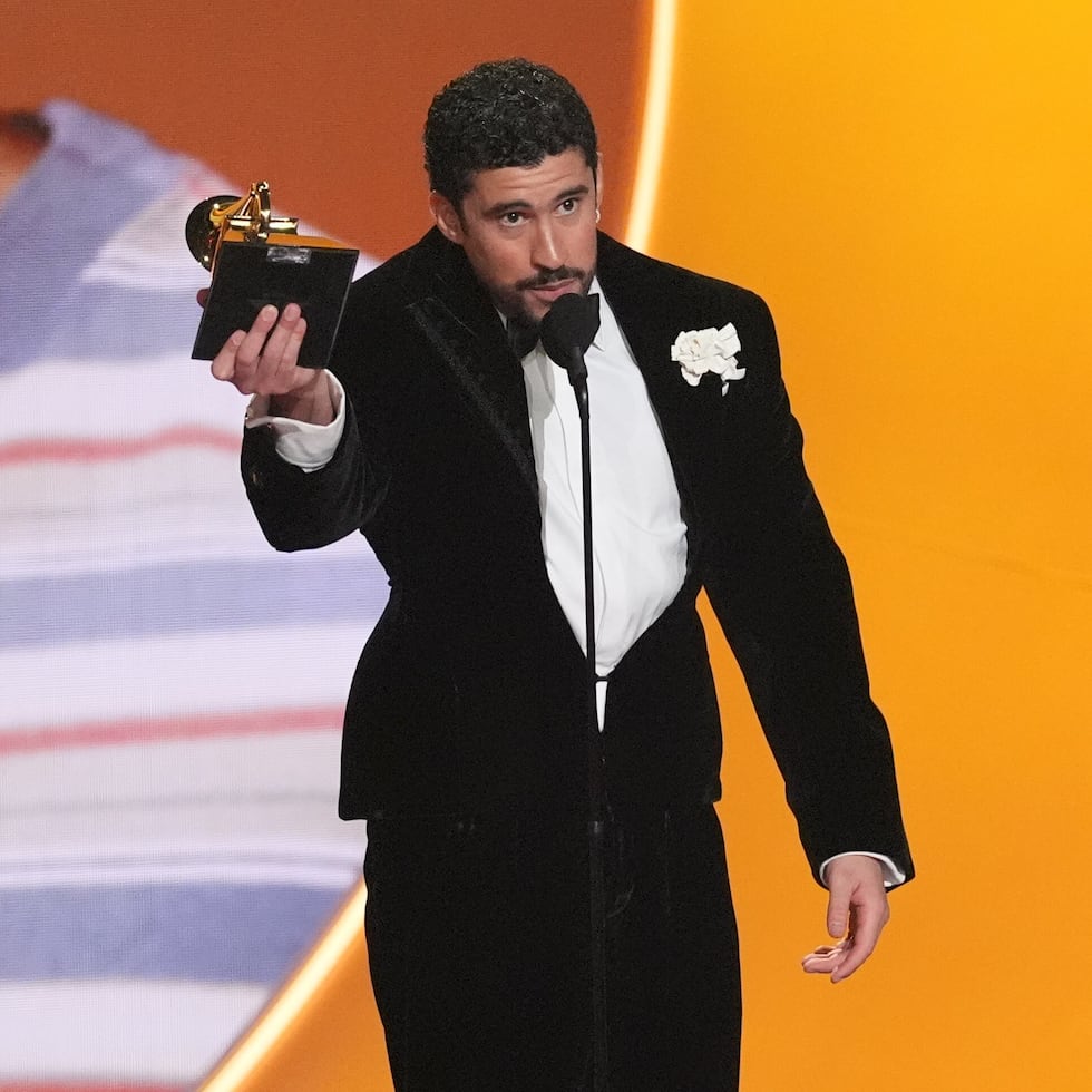 Bad Bunny accepts the award for album of the year for "Debí Tirar Más Fotos" during the 68th annual Grammy Awards on Sunday, Feb. 1, 2026, in Los Angeles. (AP Photo/Chris Pizzello)