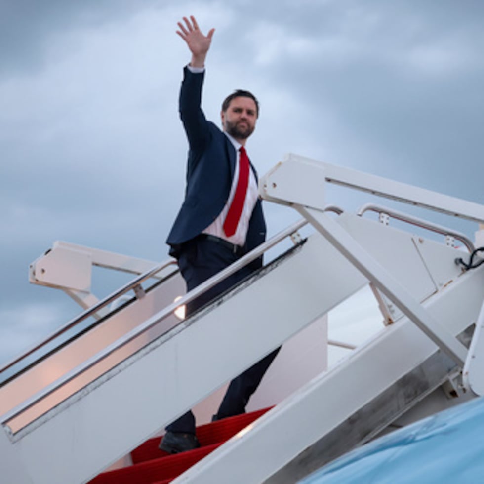 Vice President JD Vance waves as he boards Air Force Two to depart for Budapest, at Joint Base Andrews, Md., Monday, April 6, 2026. (Jonathan Ernst/Pool via AP)