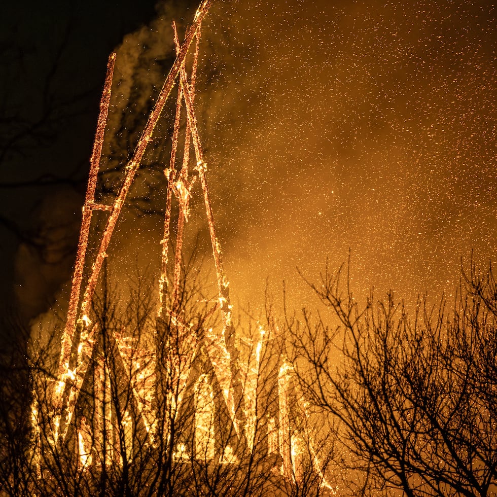 The tower of the Vondelkerk church burns during New Year's Eve, in Amsterdam on January 1, 2026. (Photo by Laurens Niezen / ANP / AFP) / Netherlands OUT / NETHERLANDS OUT / NETHERLANDS OUT