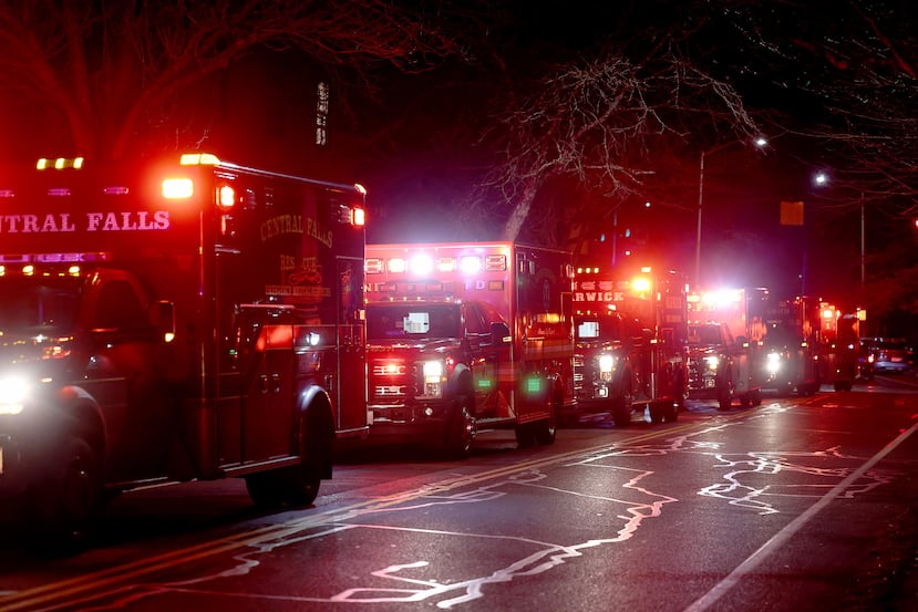 Ambulances line Hope Street at Brown University in Providence, R.I., Saturday, Dec. 13, 2025, during reports of a shooting. (AP Photo/Mark Stockwell)