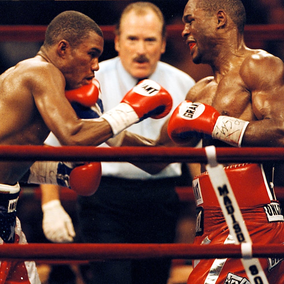Bernard Hopkins (right) deployed effective punches to keep Féliix "Tito" Trinidad at bay.