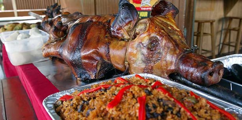 En Puerto Rico decir Navidad es casi sinónimo de arroz con gandules, lechón a la varita, guineítos en escabeche o hervidos, arroz con dulce y majarete. (Archivo)