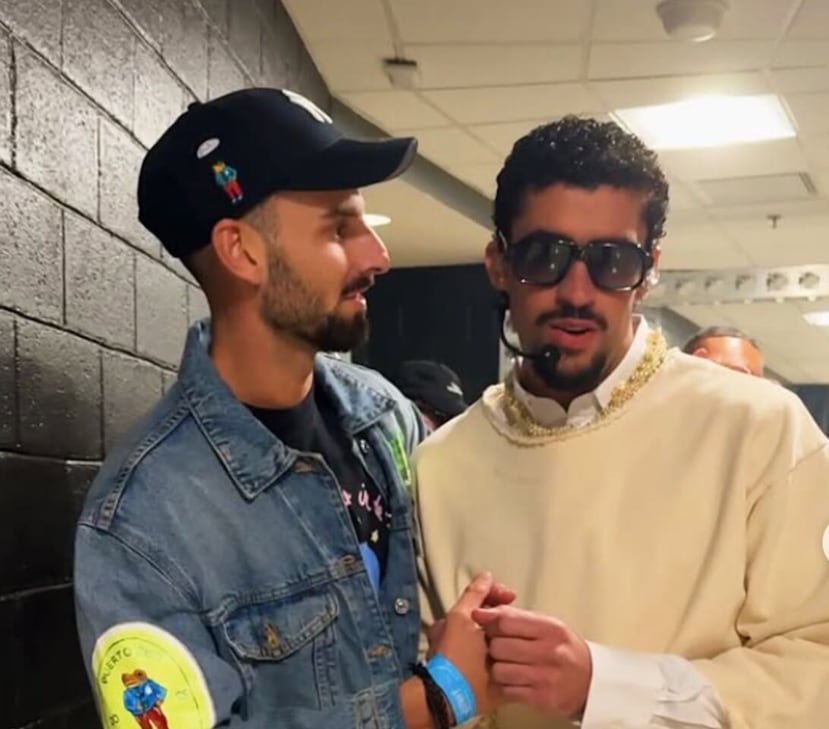 Bad Bunny, right, greets young Spaniard Jesús Rivas, left.