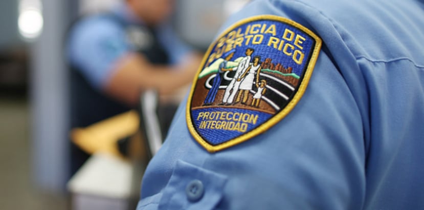 Dos agentes del precinto de Monte Hatillo que quedaron atrapados en el fuego cruzado intentaron repeler la agresión de la que fueron objeto por sicarios. (Archivo)
