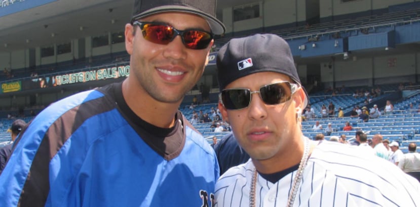 Carlos Beltrán y Daddy Yankee (Archivo)