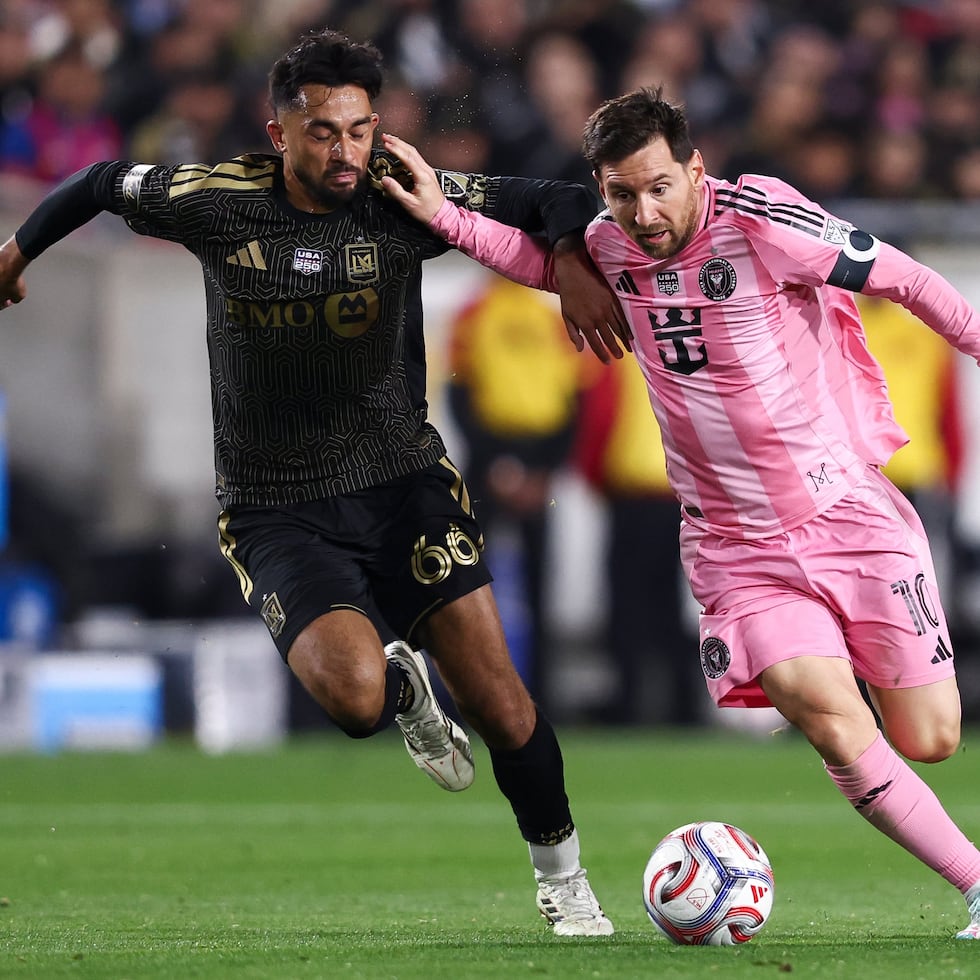Lionel Messi shakes off LAFC's Mathieu Choinière during Inter Miami's 3-0 loss on Saturday.