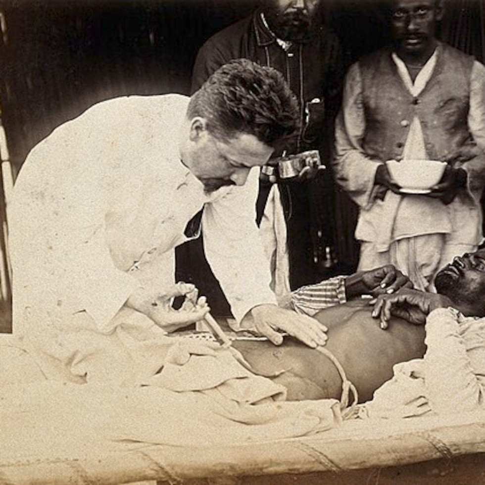 Doctor Simmonds injecting his curative serum in a plague patient, during the outbreak of bubonic plague in Karachi, India, in 1897.